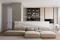 White apartment interior with industrial-style concrete statement walls 1