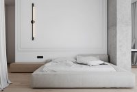 White apartment interior with industrial-style concrete statement walls 5