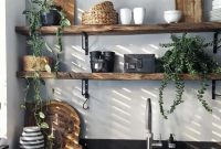 Contemporary kitchen with rough wood shelves