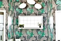 Go with bold green for small bathroom