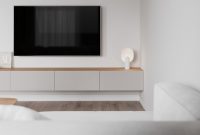 Modern white apartment interior that lightly warmed with natural wood 2