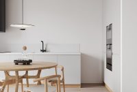 Modern white apartment interior that lightly warmed with natural wood 4