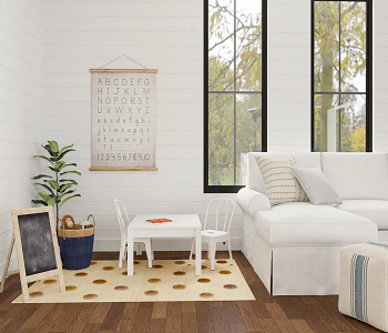 Tuck your kid's toys to the side How To Design A Comfortable Playroom Within Your Living Space