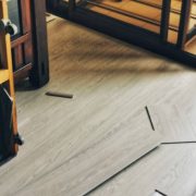 Home improvement on flooring work adding wooden floor in living room