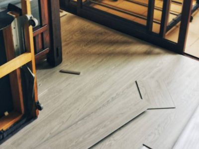 Home improvement on flooring work adding wooden floor in living room