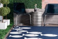 White fish in dark navy rug