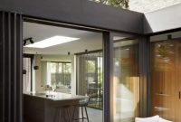 Contemporary House with Small Inner Courtyards to Create a Connection to Outdoors 2