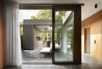 Contemporary House with Small Inner Courtyards to Create a Connection to Outdoors 3