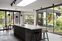 Contemporary House with Small Inner Courtyards to Create a Connection to Outdoors 4