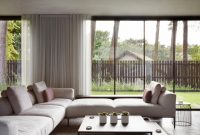 Contemporary House with Small Inner Courtyards to Create a Connection to Outdoors 7