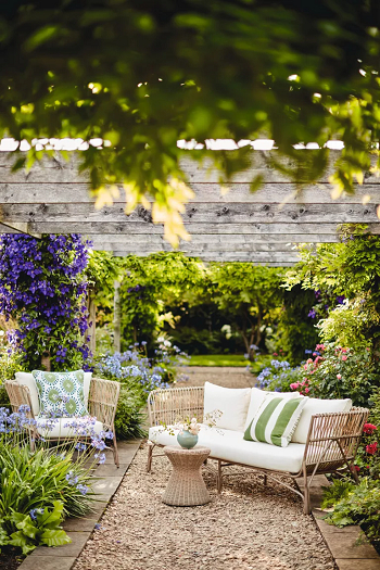 Under a pergola seating space Splendid Ways To Create Outdoor Summer Living Room Ideas 