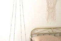 Boho bedroom with a hanging bedside table