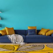Modern living room with sofa and book shelf. 3d render