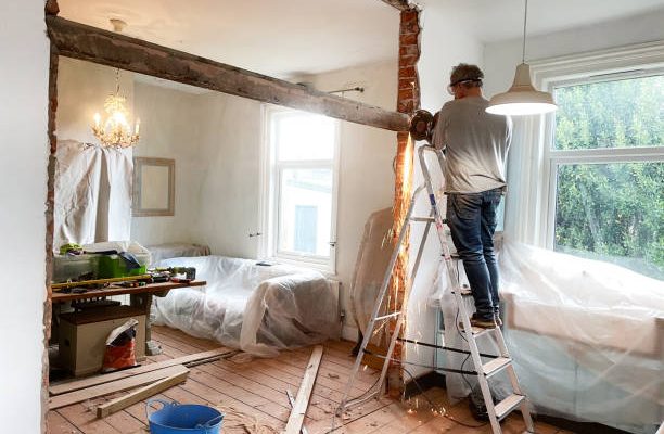 Using angle-grinder to remove beam