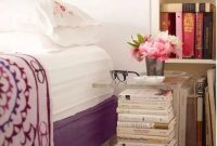 With stack of books