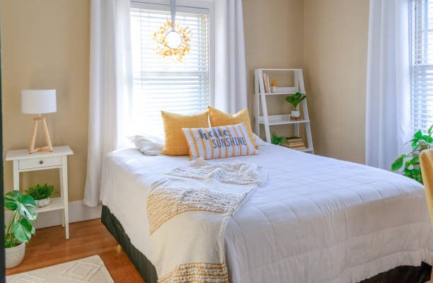 Cozy and stylish small bedroom decor in yellow and white