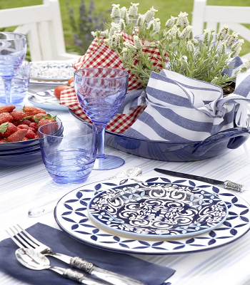 Set the blue table with white and red Festive Ways To Enjoy The Outdoors With Patriotic Summer Theme Decor
