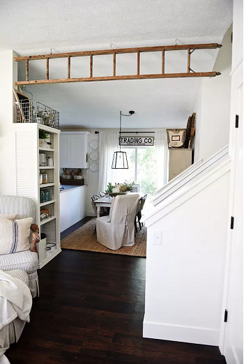Use ladder as a beam How To Decorate Home With Repurposed Wooden Ladder Ideas For Charming Look