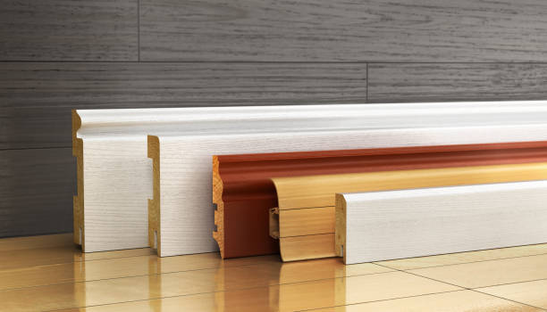 Set of skirting different form on a wood background. 3d illustration