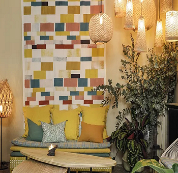 Fall-colored linens feat warm lighting Inviting Ways To Décor Home This Fall For An Autumnal Mood