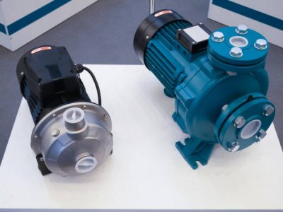 Two electric motorized portable water pumps at hardware store