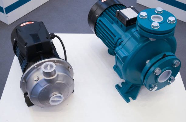 Two electric motorized portable water pumps at hardware store