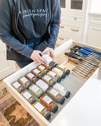 A spice drawer liner Above Brilliant Ways To Organize Your Crowded Kitchen Drawers