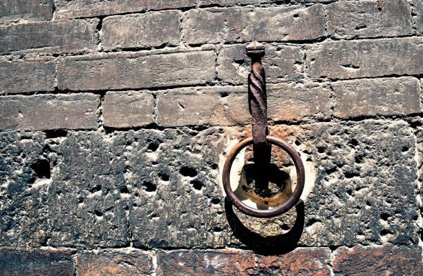 Antique iron ring on the brick wall of a historic building