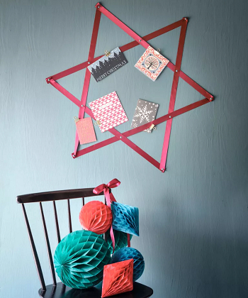 Attach card to the star shape on the wall How To Have Creative Christmas Card Display Ideas This Year