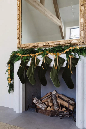 Simple fireplace decoration with stocking Simple Applicable Decorating Ideas To Have a Christmassy Look
