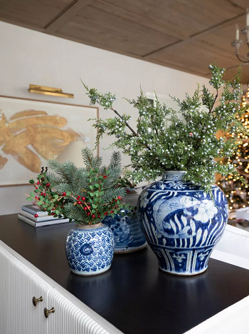 Vases with foraged foliage Simple Applicable Decorating Ideas To Have a Christmassy Look