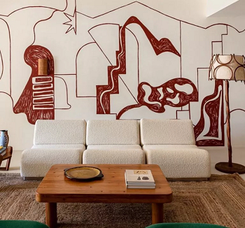 Line drawn frescos in living room Wall Art Trends To Elevate Home Interior Design In 2023