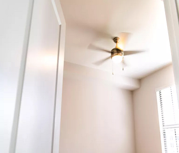 Alter the rotation of the ceiling fan Guaranteed Rules To Keep A Living Room Warm Without Heating