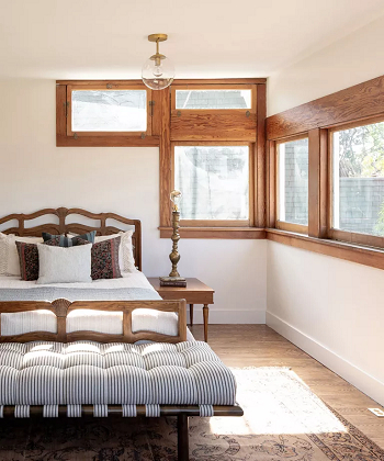 A bed against a wall Bedroom Placement Ideas To Feel Completely Relaxed, Comfortable, And Rested