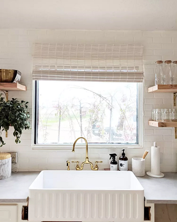 Keep scrubber in a utensil jar Organizational Tips To Keep Kitchen Sink Clean, Tidy, And Beauty Every Day