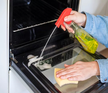Tackle the oven Ultimate Kitchen Cleaning Checklist For A Tidiest Space
