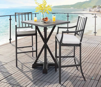Two high chairs and a table How To Fit An Outdoor Bar into A Small Backyard For A Perfect Sundowner Spot