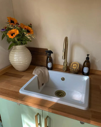 Use pretty soap bottles Organizational Tips To Keep Kitchen Sink Clean, Tidy, And Beauty Every Day