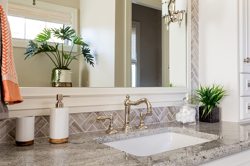 Vanity with mirror in luxury home