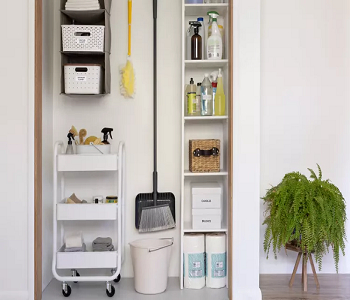Mop and broom holder on the wall Must-Have Organizing Tools To Keep Home Clean And Tidy As Always