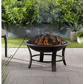 Metal round outdoor wood-burning fire pit Under $50 Items To Give Your Patio A Breathtaking Summer Refresh