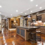 Showcase home with glossy basement flooring and large kitchen