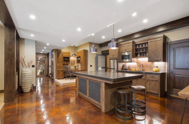 Showcase home with glossy basement flooring and large kitchen