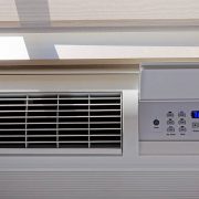 Heating - air conditioning thermostat with window.