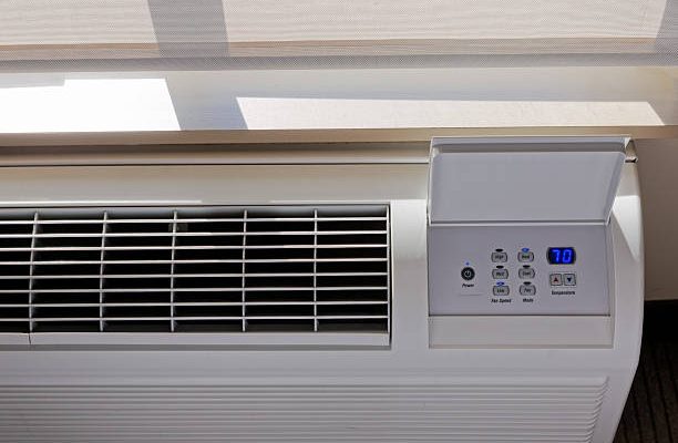 Heating - air conditioning thermostat with window.