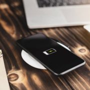 Close-up phone charging on wireless charger device