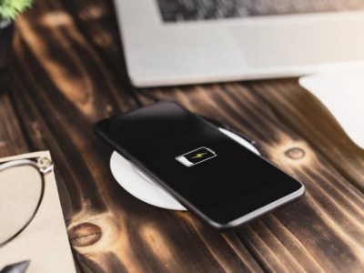 Close-up phone charging on wireless charger device