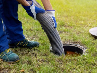 Pumping out household septic tank. drain and sewage cleaning service