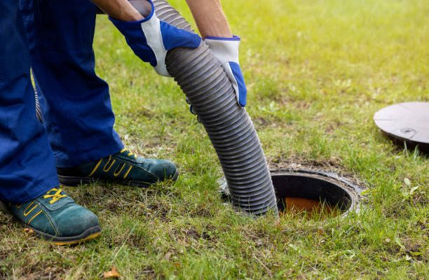 Pumping out household septic tank. drain and sewage cleaning service
