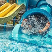 Little girl in water park. actually little feet in waterpark.